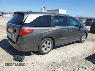 2018 Honda Odyssey EX-L with VIN 5FNRL6H78JB069850, listed as a Copart auction lot 49771875 with 103,914 mi miles and Salvage Title. Bid and sale history available at DreamBid. Image 3.