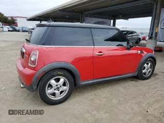 2009 MINI Hardtop with VIN WMWMF33519TW77558, listed as a Copart auction lot 54556785 with 97,749 mi miles and Salvage Title. Bid and sale history available at DreamBid. Image 3.