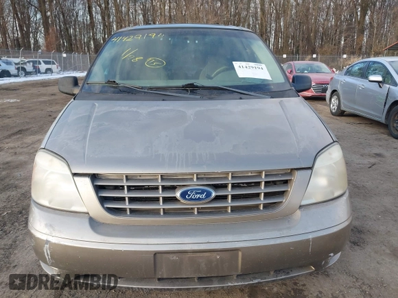 2005 Ford Freestar SE z VIN 2FMZA51645BA05742, wystawiony jako IAAI lot #41429194 z przebiegiem 145 415 mil mil oraz . Historia ofert i sprzedaży dostępna na DreamBid. Obrazek 12.
