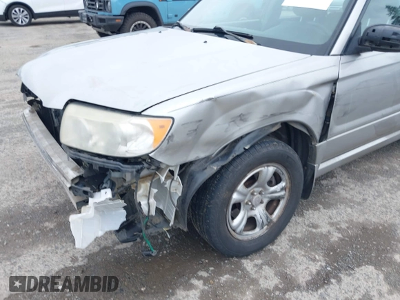 2006 Subaru Forester 2.5 X with VIN JF1SG63676G751013, listed as a IAAI auction lot 41905318 with 214,172 mi miles. Bid and sale history available at carsss.com. Image 6.