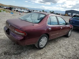 1997 Nissan Altima XE z VIN 1N4BU31DXVC181006, wystawiony jako Copart lot #57670815 z przebiegiem 98 202 mil mil oraz Szkoda całkowita • Salvage title. Historia ofert i sprzedaży dostępna na DreamBid. Obrazek 3.