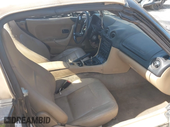 1999 Mazda MX-5 Miata with VIN JM1NB3539X0112181, listed as a IAAI auction lot 42397232 with 11 mi miles and . Bid and sale history available at DreamBid. Image 5.