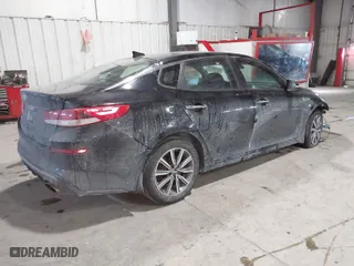 2019 Kia Optima LX with VIN 5XXGT4L3XKG377990, listed as a IAAI auction lot 41636972 with 140,864 mi miles. Bid and sale history available at carsss.com. Image 4.