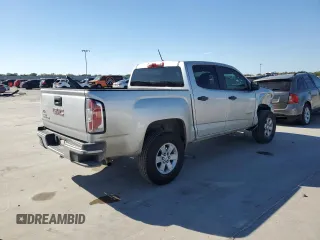 2020 GMC Canyon 2WD with VIN 1GTG5BEA2L1237021, listed as a Copart auction lot 76358214 with 77,815 mi miles and Salvage Title. Bid and sale history available at carsss.com. Image 3.