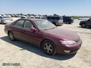 1997 Lexus ES 300 Luxury Sport Sdn with VIN JT8BF22G0V0030408, listed as a Copart auction lot 66811844 with 185,314 mi miles and Salvage Title. Bid and sale history available at carsss.com. Image 4.