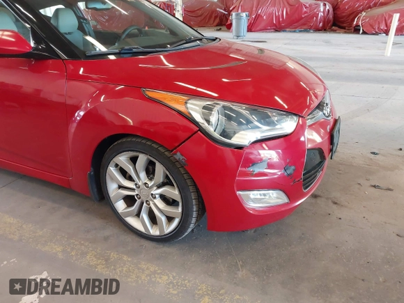 2012 Hyundai Veloster w/Gray Int z VIN KMHTC6AD3CU023998, wystawiony jako IAAI lot #42186875 z przebiegiem 170 771 mil mil oraz . Historia ofert i sprzedaży dostępna na DreamBid. Obrazek 13.