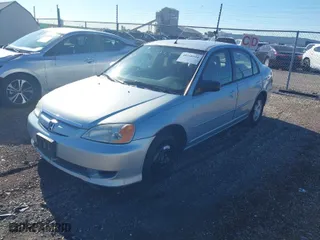 2003 Honda Civic Hybrid with VIN JHMES95673S023624, listed as a IAAI auction lot 40258910 with 181,949 mi miles. Bid and sale history available at carsss.com. Image 2.