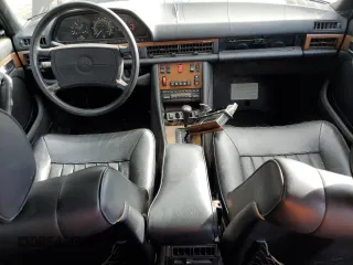 1987 Mercedes-Benz 560 with VIN WDBCA39D4HA360359, listed as a Copart auction lot 80772324 with 203,669 mi miles and Clean Title. Bid and sale history available at DreamBid. Image 8.