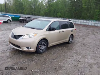 2014 Toyota Sienna XLE with VIN 5TDYK3DC1ES416999, listed as a IAAI auction lot 41972378 with 119,179 mi miles. Bid and sale history available at carsss.com. Image 17.
