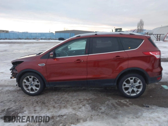 2014 Ford Escape Titanium with VIN 1FMCU9J94EUA13509, listed as a IAAI auction lot 41291232 with 174,303 mi miles. Bid and sale history available at carsss.com. Image 15.