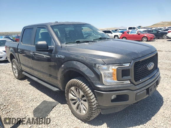 2018 Ford F-150 XL with VIN 1FTEW1EPXJKE71093, listed as a Copart auction lot 63812265 with 122,361 mi miles and Salvage title. Bid and sale history available at DreamBid. Image 4.