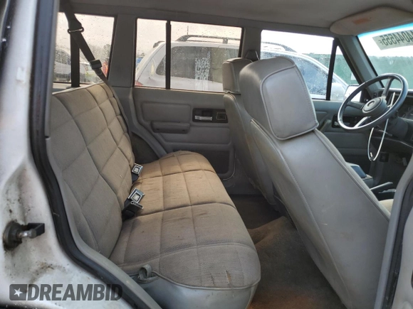 1994 Jeep Cherokee Sport with VIN 1J4FT68S0RL234669, listed as a Copart auction lot 44044555 with 282,179 mi miles and Salvage title. Bid and sale history available at DreamBid. Image 10.
