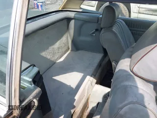 1982 Mercedes-Benz 380 SL z VIN WDBBA45A0CB017032, wystawiony jako IAAI lot #42461326 z przebiegiem 153 044 mil mil oraz . Historia ofert i sprzedaży dostępna na DreamBid. Obrazek 8.