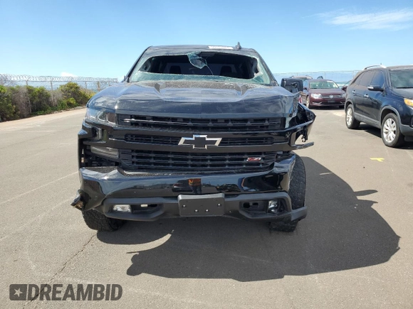 2021 Chevrolet Silverado 1500 LT Trail Boss with VIN 3GCPYFEDXMG455395, listed as a Copart auction lot 59181684 with 31,123 mi miles and Salvage Title. Bid and sale history available at DreamBid. Image 5.