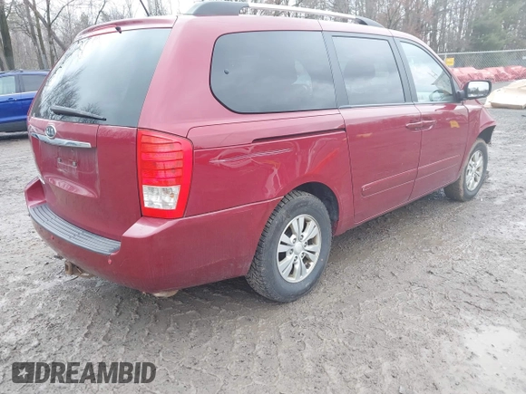 2012 Kia Sedona LX with VIN KNDMG4C72C6493162, listed as a IAAI auction lot 42012760 with 158,433 mi miles. Bid and sale history available at carsss.com. Image 4.