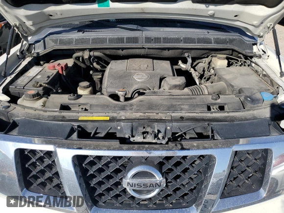 2015 Nissan Armada Platinum z VIN 5N1AA0NCXFN616784, wystawiony jako Copart lot #73331944 z przebiegiem 187 771 mil mil oraz Szkoda całkowita • Salvage title. Historia ofert i sprzedaży dostępna na DreamBid. Obrazek 13.