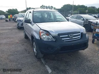 2005 Honda CR-V LX with VIN SHSRD68595U302483, listed as a IAAI auction lot 40528497 with 171,311 mi miles. Bid and sale history available at carsss.com. Image 6.