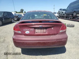 2006 Ford Taurus SEL z VIN 1FAFP56U36A166972, wystawiony jako Copart lot #57146175 z przebiegiem 130 205 mil mil oraz Czysty tytuł • Clean title. Historia ofert i sprzedaży dostępna na DreamBid. Obrazek 6.