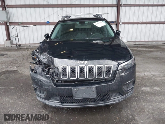 2020 Jeep Cherokee Latitude z VIN 1C4PJLCB1LD535765, wystawiony jako IAAI lot #41580618 z przebiegiem 56 040 mil mil oraz . Historia ofert i sprzedaży dostępna na DreamBid. Obrazek 12.