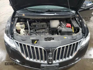 2013 Lincoln MKX z VIN 2LMDJ8JK0DBL26172, wystawiony jako Copart lot #54332155 z przebiegiem 158 182 mil mil oraz Szkoda całkowita • Salvage title. Historia ofert i sprzedaży dostępna na DreamBid. Obrazek 12.