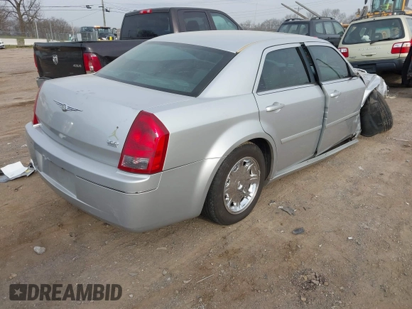 2005 Chrysler 300 with VIN 2C3JA53G85H159623, listed as a IAAI auction lot 41773424 with 127,764 mi miles. Bid and sale history available at carsss.com. Image 4.
