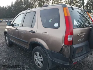 2003 Honda CR-V EX with VIN JHLRD788X3C004304, listed as a IAAI auction lot 41385254 with 143,940 mi miles. Bid and sale history available at carsss.com. Image 6.