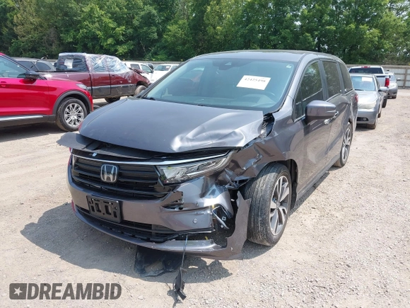 2022 Honda Odyssey Touring z VIN 5FNRL6H83NB023583, wystawiony jako IAAI lot #42425498 z przebiegiem Nie podano mil oraz . Historia ofert i sprzedaży dostępna na DreamBid. Obrazek 6.