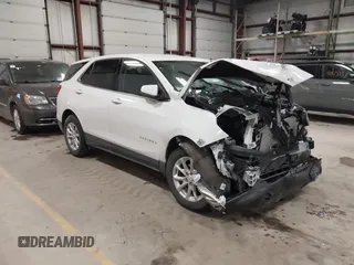 2018 Chevrolet Equinox LT z VIN 3GNAXJEV9JL410690, wystawiony jako IAAI lot #41571620 z przebiegiem 21 797 mil mil oraz . Historia ofert i sprzedaży dostępna na DreamBid. Obrazek 1.