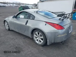 2005 Nissan 350Z Touring with VIN JN1AZ34E85M652465, listed as a IAAI auction lot 41418161 with 153,099 mi miles. Bid and sale history available at carsss.com. Image 3.