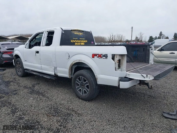 2015 Ford F-150 XLT with VIN 1FTEX1EP1FFA21653, listed as a IAAI auction lot 41597518 with 153,111 mi miles. Bid and sale history available at carsss.com. Image 3.