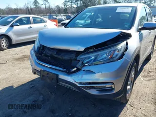 2015 Honda CR-V EX with VIN 2HKRM4H58FH679739, listed as a IAAI auction lot 41395029 with 153,776 mi miles and . Bid and sale history available at DreamBid. Image 6.