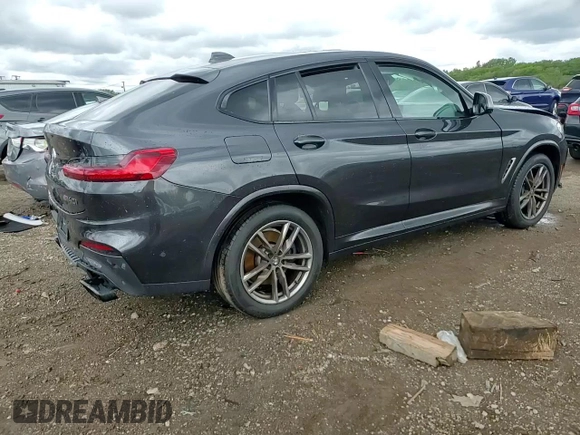 2021 BMW X4 M40i z VIN 5UX2V5C0XM9F04867, wystawiony jako Copart lot #57890555 z przebiegiem 40 563 mil mil oraz Szkoda całkowita • Salvage title. Historia ofert i sprzedaży dostępna na DreamBid. Obrazek 14.