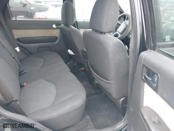 2010 Mercury Mariner with VIN 4M2CN8B75AKJ09335, listed as a IAAI auction lot 41279542 with 258,035 mi miles. Bid and sale history available at carsss.com. Image 8.