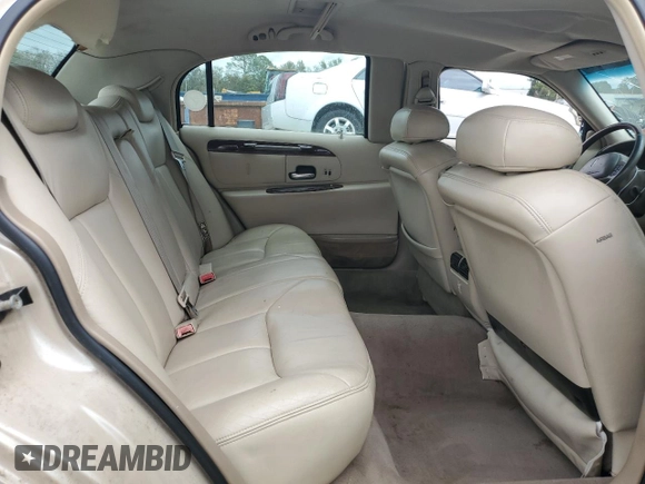 2001 Lincoln Town Car Cartier L z VIN 1LNHM85W61Y640344, wystawiony jako Copart lot #74755564 z przebiegiem Nie podano mil oraz Szkoda całkowita • Salvage title. Historia ofert i sprzedaży dostępna na DreamBid. Obrazek 10.
