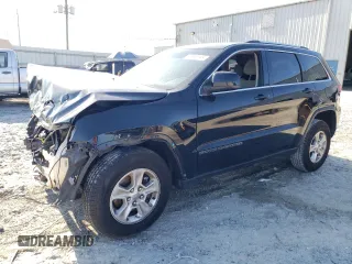 2017 Jeep Grand Cherokee Laredo with VIN 1C4RJEAG4HC952605, listed as a Copart auction lot 56693145 with 115,035 mi miles and Salvage title. Bid and sale history available at DreamBid. Image 1.