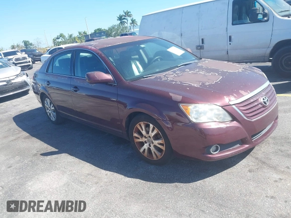 2008 Toyota Avalon XL with VIN 4T1BK36BX8U309181, listed as a IAAI auction lot 41819670 with 227,129 mi miles. Bid and sale history available at carsss.com. Image 1.