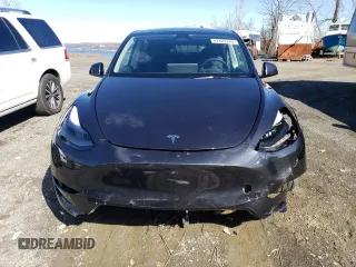 2024 Tesla Model Y with VIN 7SAYGDED3RF114643, listed as a Copart auction lot 56557075 with 3,021 mi miles and Salvage Title. Bid and sale history available at DreamBid. Image 5.