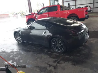 2016 Nissan 370Z with VIN JN1AZ4EHXGM935516, listed as a IAAI auction lot 41966014 with 92,147 mi miles. Bid and sale history available at carsss.com. Image 14.