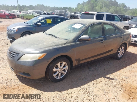 2007 Toyota Camry CE with VIN 4T1BE46K47U665377, listed as a IAAI auction lot 42133285 with 157,396 mi miles. Bid and sale history available at carsss.com. Image 2.