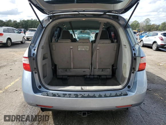 2013 Honda Odyssey EX z VIN 5FNRL5H40DB051489, wystawiony jako Copart lot #41862515 z przebiegiem 172 966 mil mil oraz Szkody całkowita. Historia ofert i sprzedaży dostępna na DreamBid. Obrazek 6.