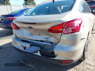 2018 Ford Focus SE with VIN 1FADP3FE8JL256698, listed as a IAAI auction lot 41757179 with 118,498 mi miles. Bid and sale history available at carsss.com. Image 6.
