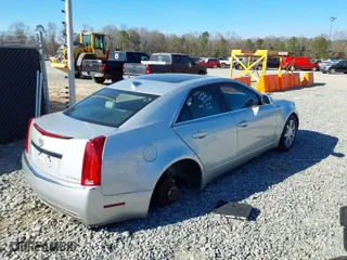 2009 Cadillac CTS AWD w/1SB with VIN 1G6DS57V090127289, listed as a IAAI auction lot 41675952 with 147,464 mi miles. Bid and sale history available at carsss.com. Image 4.