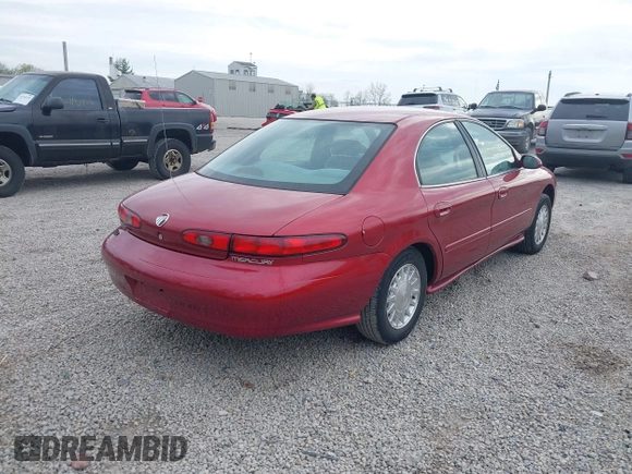 1999 Mercury Sable GS with VIN 1MEFM50U4XG622650, listed as a IAAI auction lot 42099721 with 86,899 mi miles. Bid and sale history available at carsss.com. Image 4.