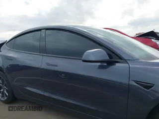 2022 Tesla Model 3 Long Range with VIN 5YJ3E1EB9NF164774, listed as a IAAI auction lot 41915755 with 39,625 mi miles and . Bid and sale history available at DreamBid. Image 13.
