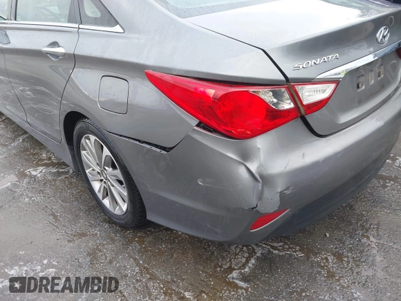 2014 Hyundai Sonata SE with VIN 5NPEC4AC5EH894598, listed as a IAAI auction lot 41242457 with 153,635 mi miles and . Bid and sale history available at DreamBid. Image 16.