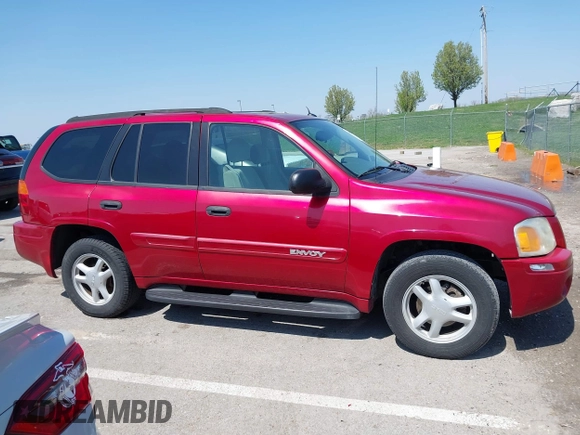 2005 GMC Envoy SLT with VIN 1GKDS13SX52144959, listed as a IAAI auction lot 41968495 with 238,199 mi miles. Bid and sale history available at carsss.com. Image 13.