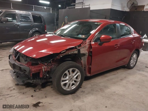 2018 Toyota Yaris iA with VIN 3MYDLBYV0JY315135, listed as a IAAI auction lot 41284774 with 64,561 mi miles. Bid and sale history available at carsss.com. Image 2.