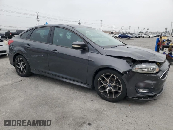 2016 Ford Focus SE z VIN 1FADP3F23GL405565, wystawiony jako Copart lot #60173935 z przebiegiem 82 167 mil mil oraz Szkoda całkowita • Salvage title. Historia ofert i sprzedaży dostępna na DreamBid. Obrazek 4.