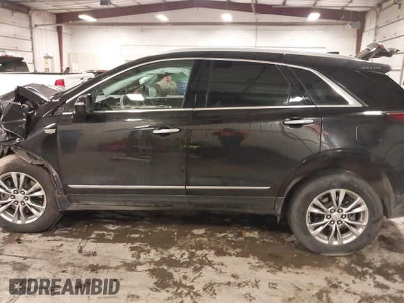 2020 Cadillac XT5 Premium Luxury AWD with VIN 1GYKNDRS4LZ190028, listed as a IAAI auction lot 41272516 with 101,820 mi miles and . Bid and sale history available at DreamBid. Image 14.