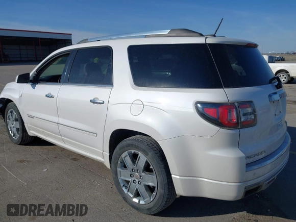 2016 GMC Acadia Denali with VIN 1GKKVTKD3GJ221449, listed as a IAAI auction lot 41777230 with 157,699 mi miles and . Bid and sale history available at DreamBid. Image 3.